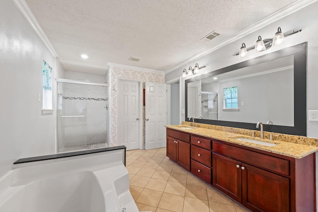 bathroom with crown molding, a textured ceiling, dual vanity, and tile flooring