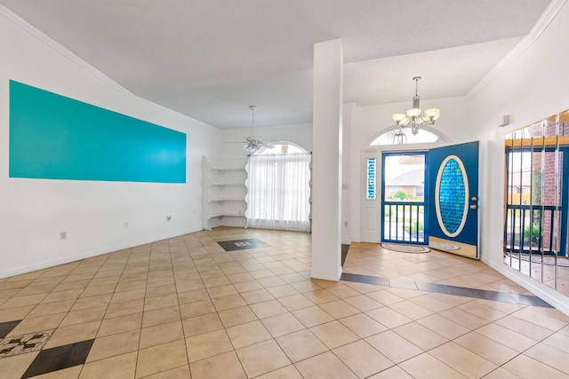 tiled entryway with ornamental molding and ceiling fan with notable chandelier