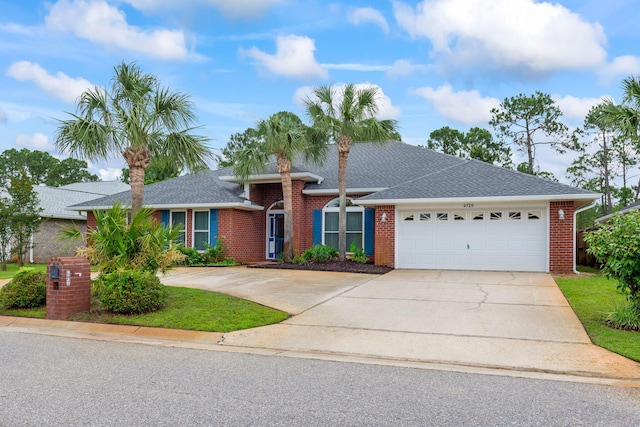 single story home with a garage