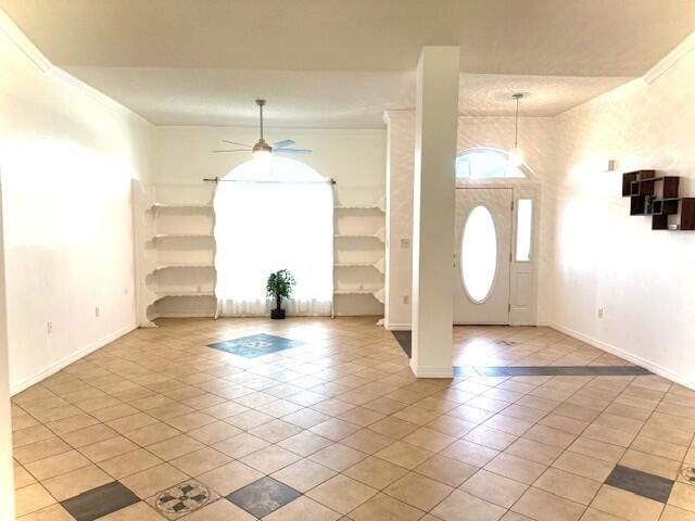 9720 Parker Lake Cir, Navarre, FL 32566 - foyer with light tile patterned flooring, baseboards, and a ceiling fan
