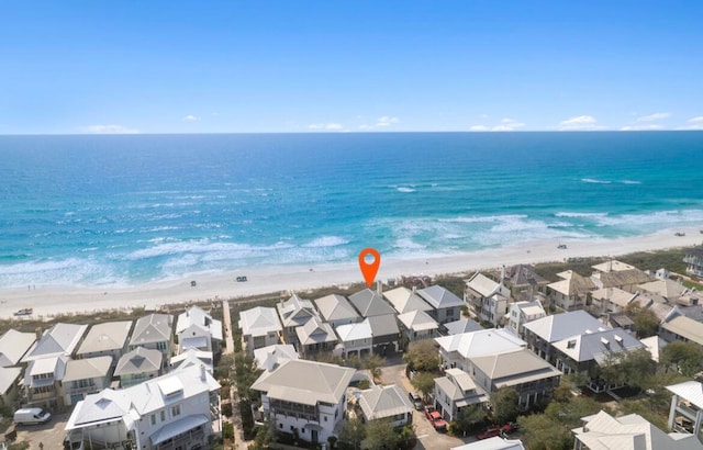 drone / aerial view with a view of the beach and a water view