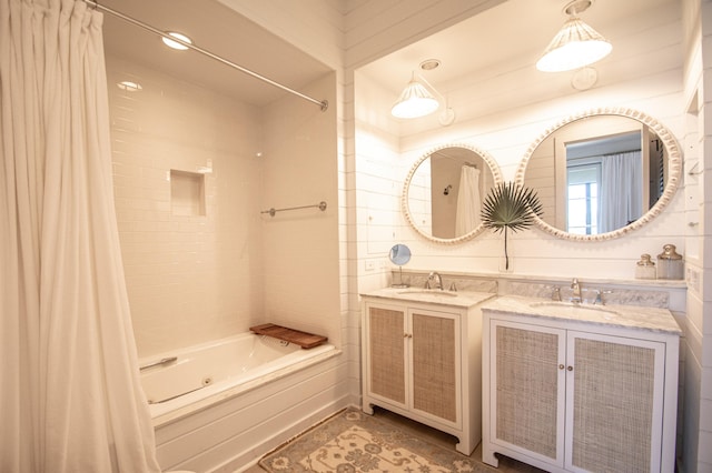 bathroom with shower / bath combo and vanity