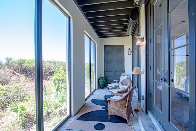 sunroom featuring a healthy amount of sunlight