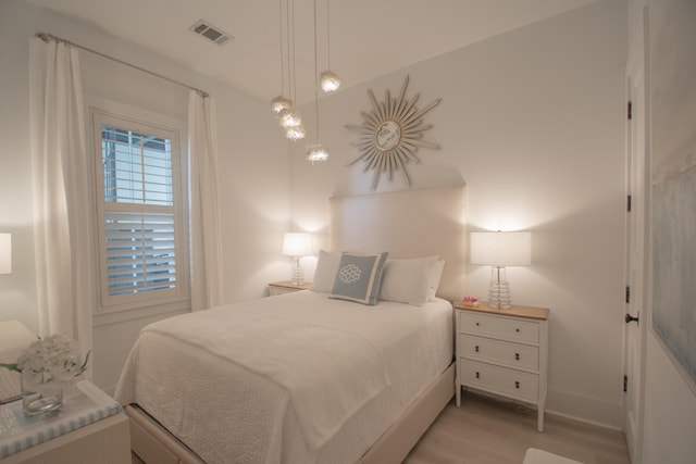 bedroom featuring light wood-type flooring