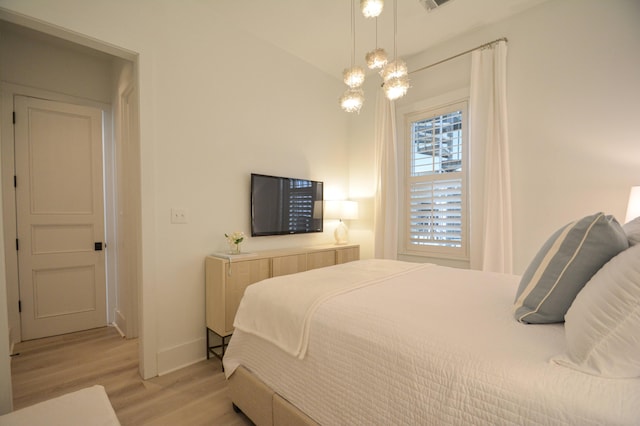 bedroom featuring light wood-type flooring