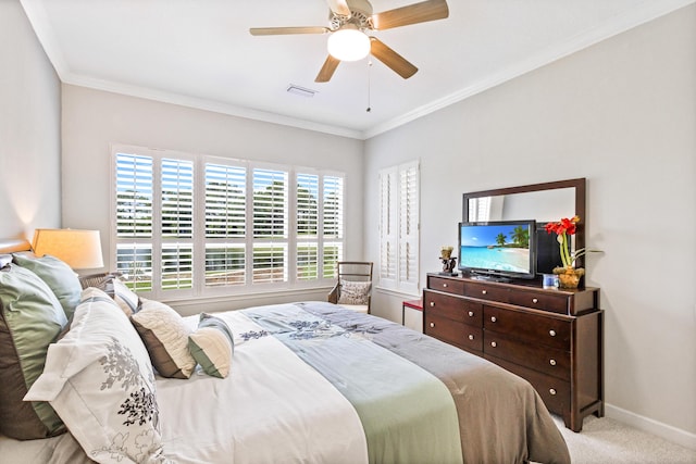 bedroom featuring ceiling fan, light colored carpet, and ornamental molding