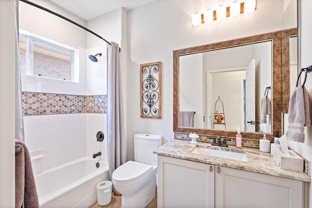 full bathroom with vanity, shower / bathtub combination with curtain, and toilet