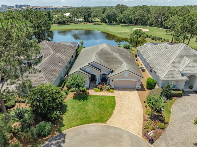 birds eye view of property featuring a water view