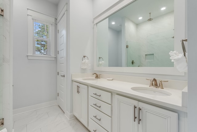 bathroom with tile floors, large vanity, and dual sinks