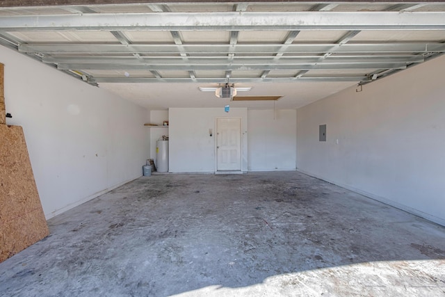 garage featuring water heater and a garage door opener