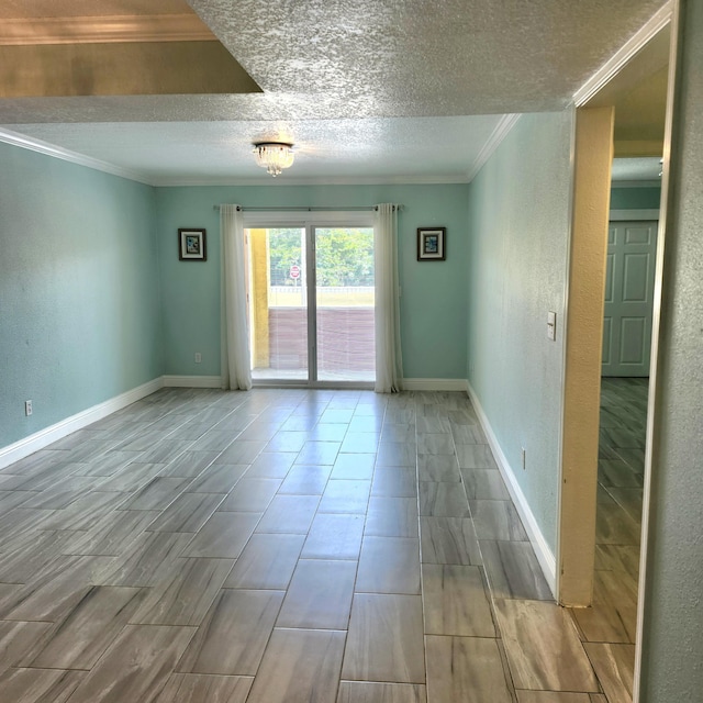 empty room featuring crown molding