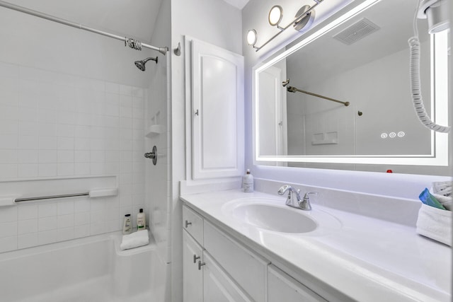 full bathroom with shower / bathtub combination, vanity, and visible vents