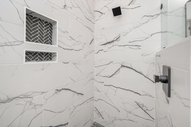 details with a tile shower