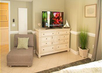 living area featuring light tile floors