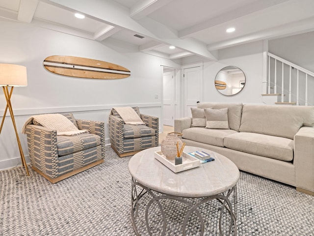 living room with beam ceiling