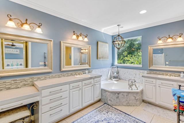 bathroom featuring tile patterned flooring, vanity, ceiling fan with notable chandelier, and ornamental molding