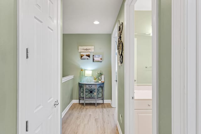 hallway featuring light wood-type flooring