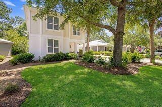 exterior space featuring a front lawn