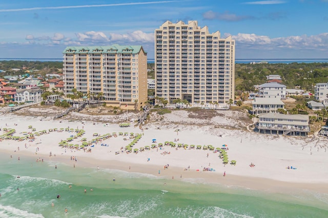 bird's eye view with a view of the beach and a water view