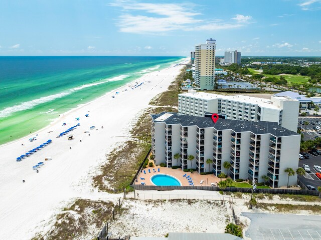 bird's eye view featuring a beach view and a water view