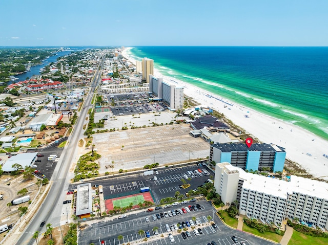 aerial view featuring a water view and a view of the beach