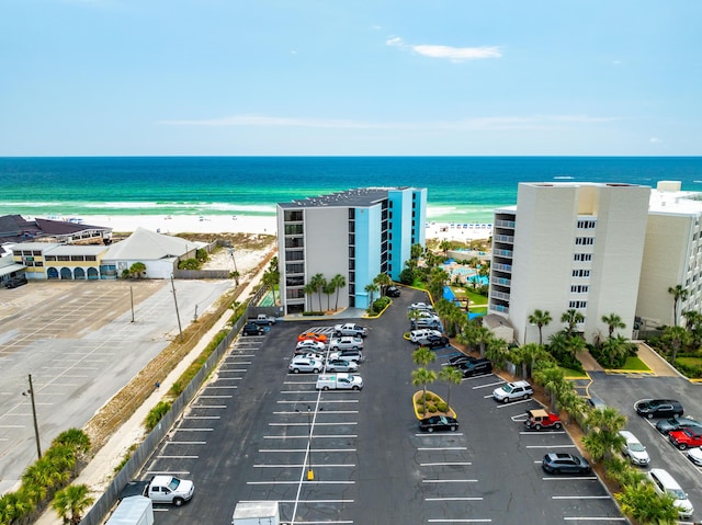 aerial view with a view of the beach and a water view