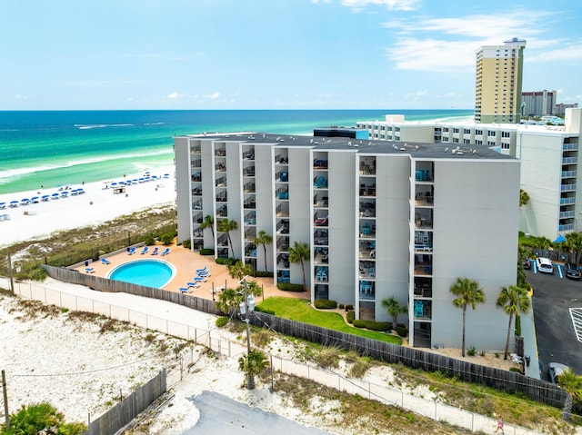 aerial view featuring a water view and a beach view