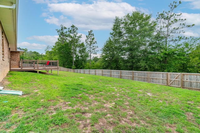 view of yard with a deck