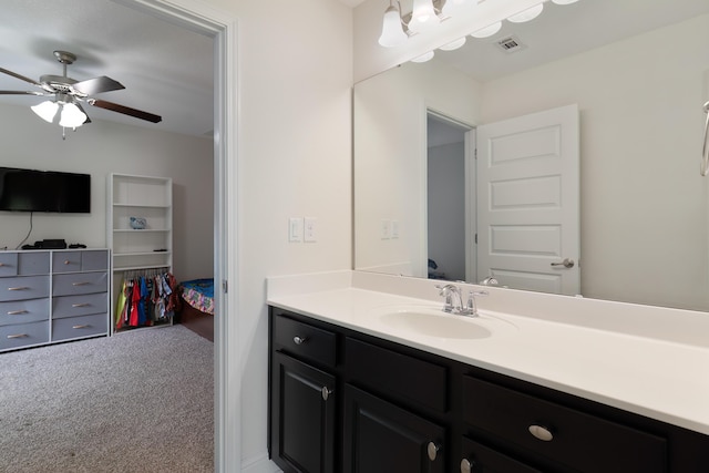 bathroom featuring vanity and ceiling fan