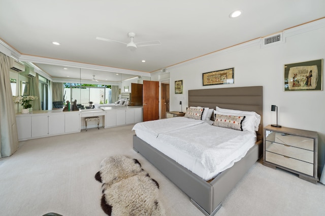 carpeted bedroom featuring ceiling fan, crown molding, and a wall mounted air conditioner