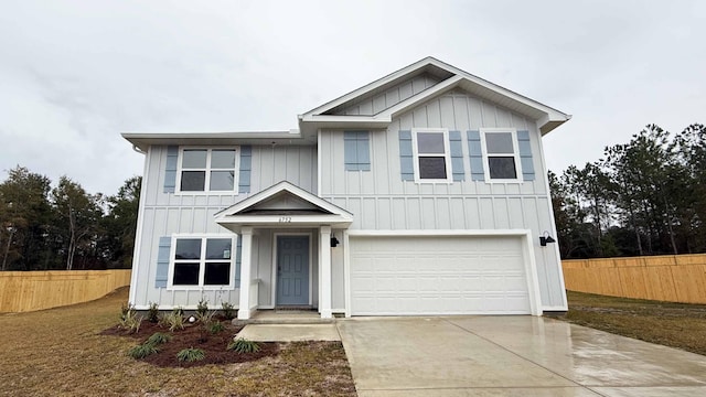 view of front of home with a garage