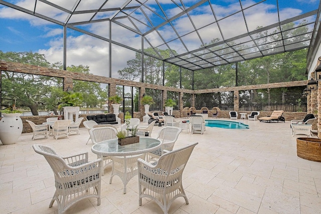 view of patio / terrace with outdoor dining space, glass enclosure, an outdoor pool, and an outdoor hangout area