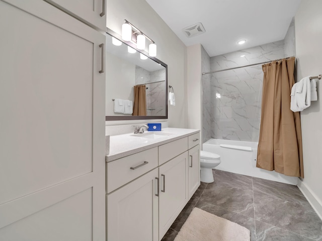 full bathroom featuring vanity, shower / bath combination with curtain, and toilet