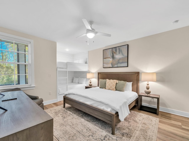 bedroom featuring ceiling fan and light wood-type flooring