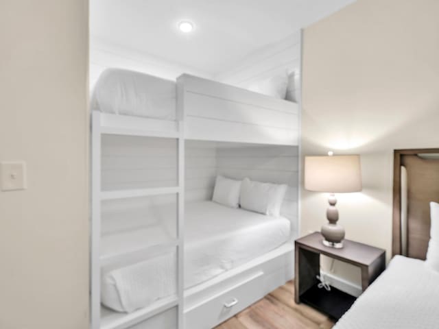 bedroom with light hardwood / wood-style floors