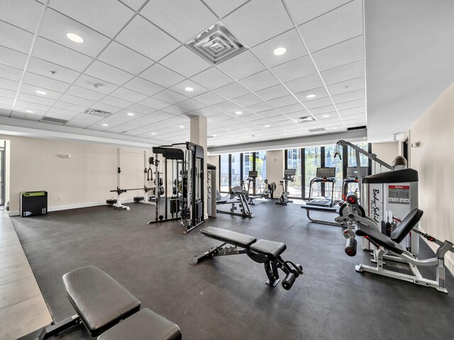 gym with a drop ceiling