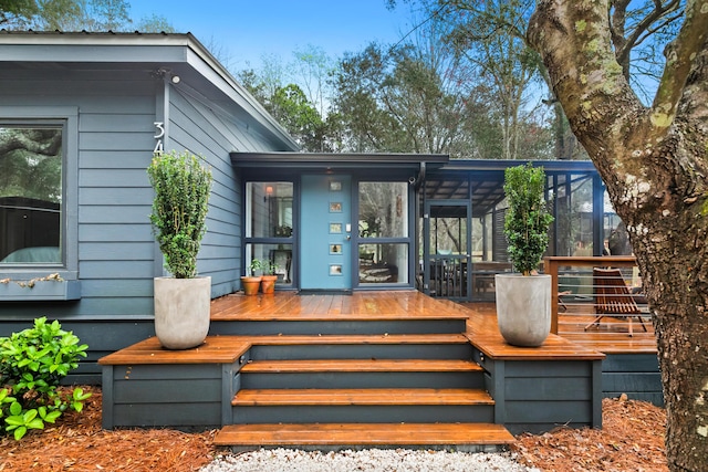 exterior space featuring a sunroom