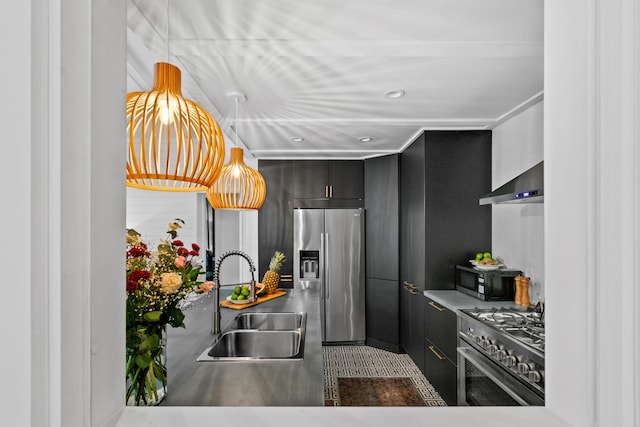 kitchen featuring appliances with stainless steel finishes, crown molding, wall chimney exhaust hood, and sink