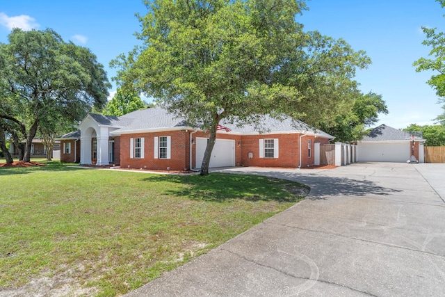 ranch-style home featuring a front yard