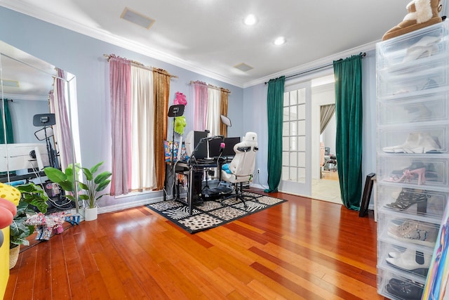 office space with crown molding and hardwood / wood-style flooring