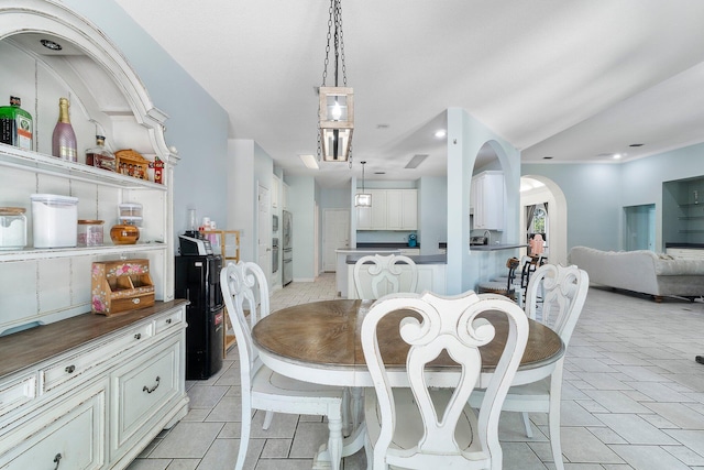 dining room with light tile floors