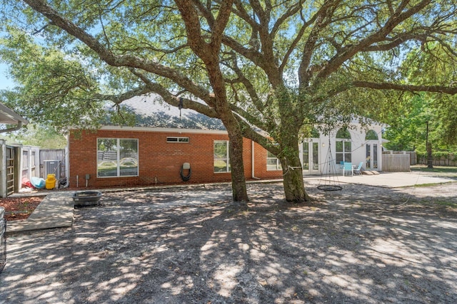 back of house with a patio area