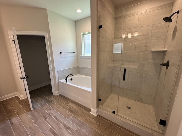 bathroom with independent shower and bath