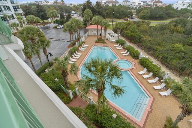 view of swimming pool with a patio area