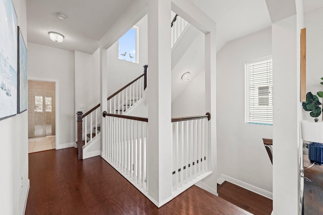 stairs with wood-type flooring