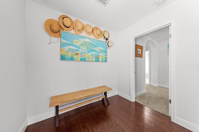 hallway with wood-type flooring