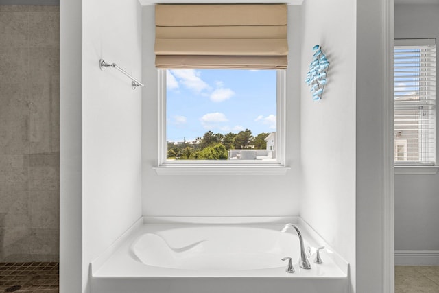 bathroom with independent shower and bath