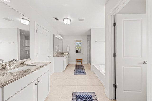bathroom featuring tile patterned floors, vanity, and plus walk in shower