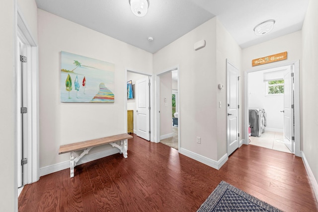 hallway featuring wood-type flooring