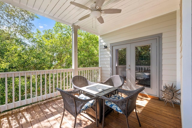 deck featuring ceiling fan and french doors